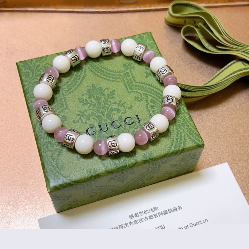 G*u*i bracelets